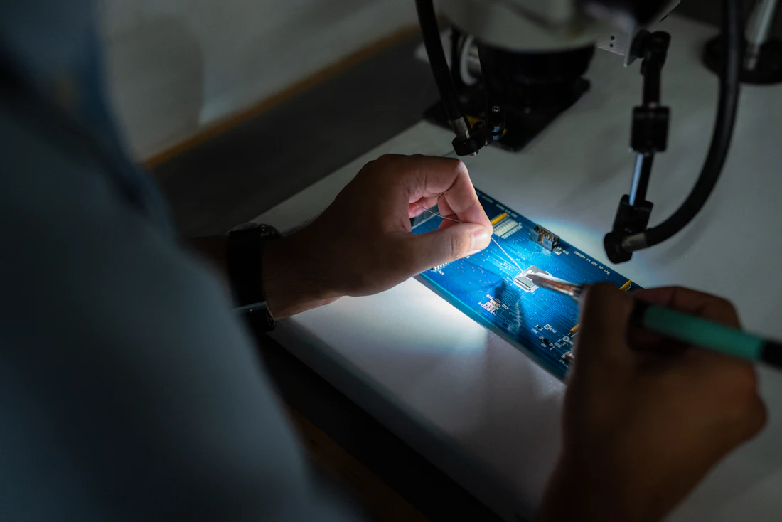 Precision electronics work illustrating manufacturing